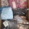 The photo shows a package with clothing in the category AP.