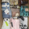 The photo shows a package with clothing in the category AP.