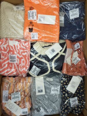 The photo shows a package with clothing in the category YA.
