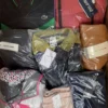The photo shows a package with clothing in the category AP.