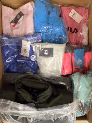 The photo shows a package with clothing in the category AP.