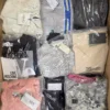 The photo shows a package with clothing in the category AP.