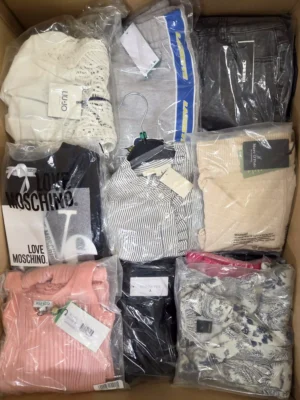 The photo shows a package with clothing in the category AP.
