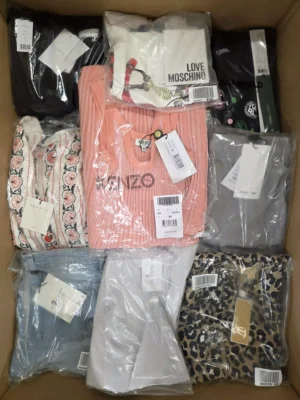 The photo shows a package with clothing in the category AP.