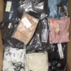 The photo shows a package with clothing in the category AP.
