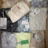 The photo shows a package with clothing in the category AP.