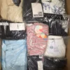 The photo shows a package with clothing in the category AP.