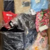 The photo shows a package with clothing in the category AP.