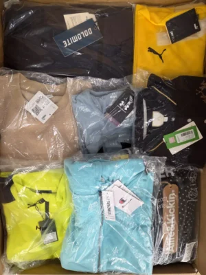 The photo shows a package with clothing in the category AP.