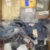 The photo shows a package with clothing in the category AP.