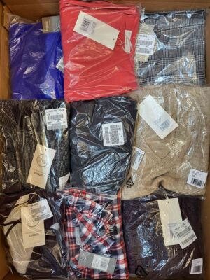 The photo shows a package with clothing in the category YA.