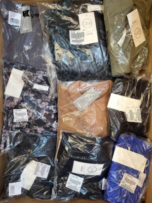 The photo shows a package with clothing in the category YA.