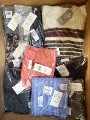 The photo shows a package with clothing in the category YA.