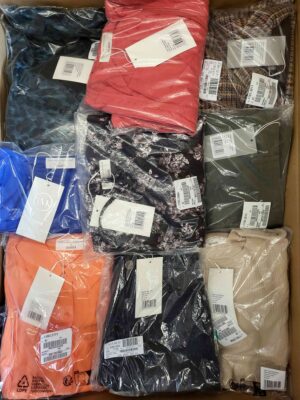 The photo shows a package with clothing in the category YA.
