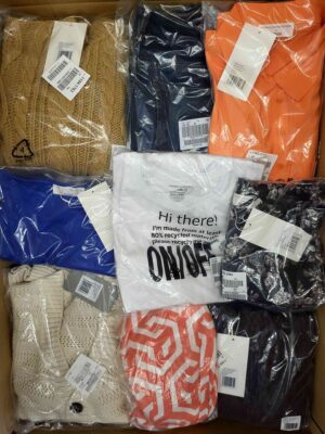 The photo shows a package with clothing in the category YA.