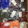 The photo shows a package with clothing in the category YA.