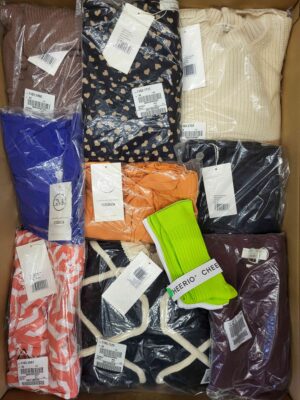 The photo shows a package with clothing in the category YA.