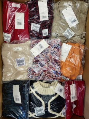 The photo shows a package with clothing in the category YA.