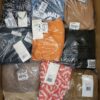 The photo shows a package with clothing in the category YA.
