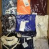 The photo shows a package with clothing in the category YA.