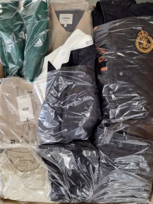 The photo shows a package with clothing in the category C.