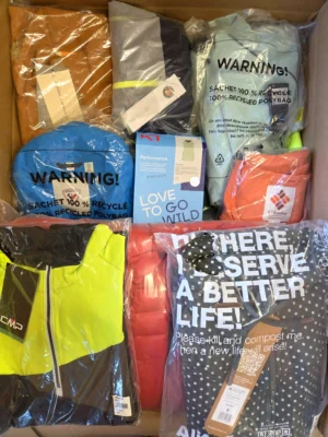 The photo shows a package with clothing in the category AP.