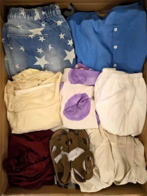 The photo shows a package with clothing in the category BSN.