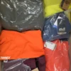 The photo shows a package with footwear in the category AS.