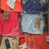 The photo shows a package with footwear in the category AS.