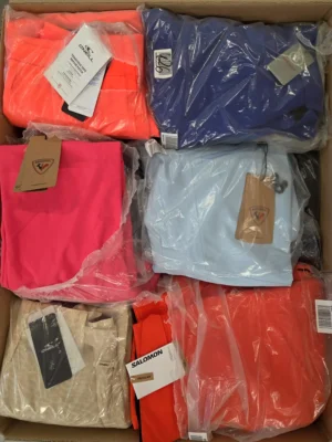 The photo shows a package with footwear in the category AS.