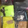 The photo shows a package with footwear in the category AS.