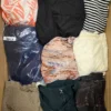 The photo shows a package with clothing in the category BSN.