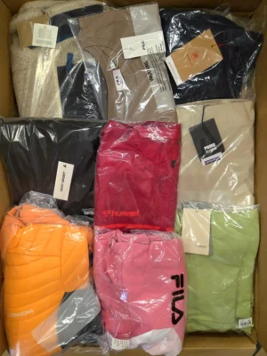 The photo shows a package with clothing in the category AP.