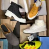 AS1413 1 The photo shows a package with footwear in the category AS.