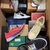 The photo shows a package with footwear in the category AS.