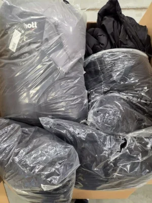 The photo shows a package with clothing in the category C.