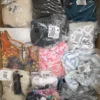 BY181 1 The photo shows a package with clothing in the category B.