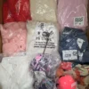 The photo shows a package with clothing in the category B.