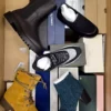 The photo shows a package with footwear in the category AS.
