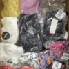 BY185 1 The photo shows a package with clothing in the category B.