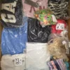 The photo shows a package with clothing in the category B.