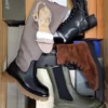 The photo shows a package with footwear in the category AS.