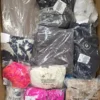 The photo shows a package with clothing in the category B.