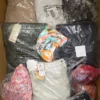 The photo shows a package with clothing in the category B.