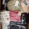 B1906 1 The photo shows a package with clothing in the category B.