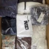 The photo shows a package with clothing in the category B.