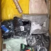The photo shows a package with clothing in the category B.