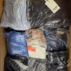 The photo shows a package with clothing in the category B.