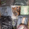 The photo shows a package with clothing in the category B.