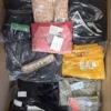 The photo shows a package with clothing in the category B.